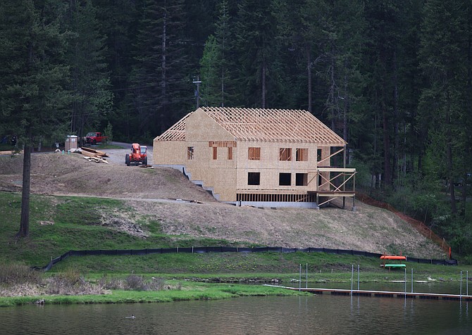 This lakefront house on Highway 97 by Squaw Bay is under construction. (LOREN BENOIT/Press)