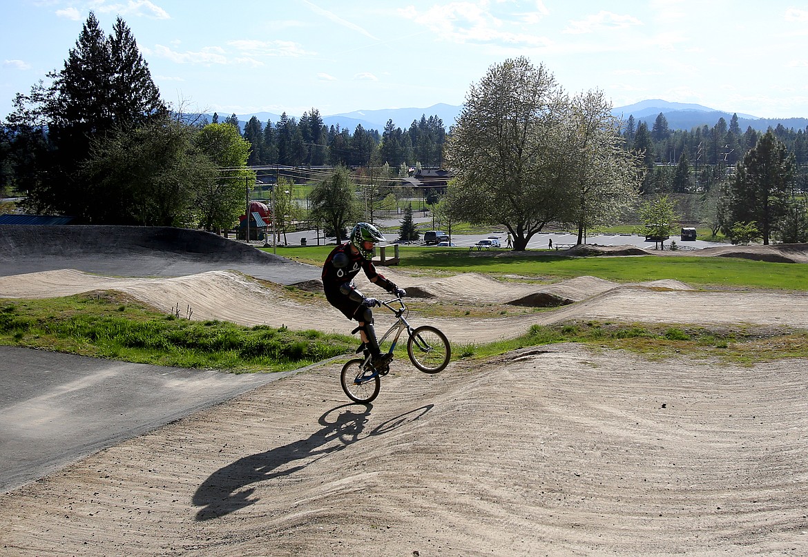 Trevor Elmore speeds over some bumps at Cherry Hill’s BMX course in 2019.