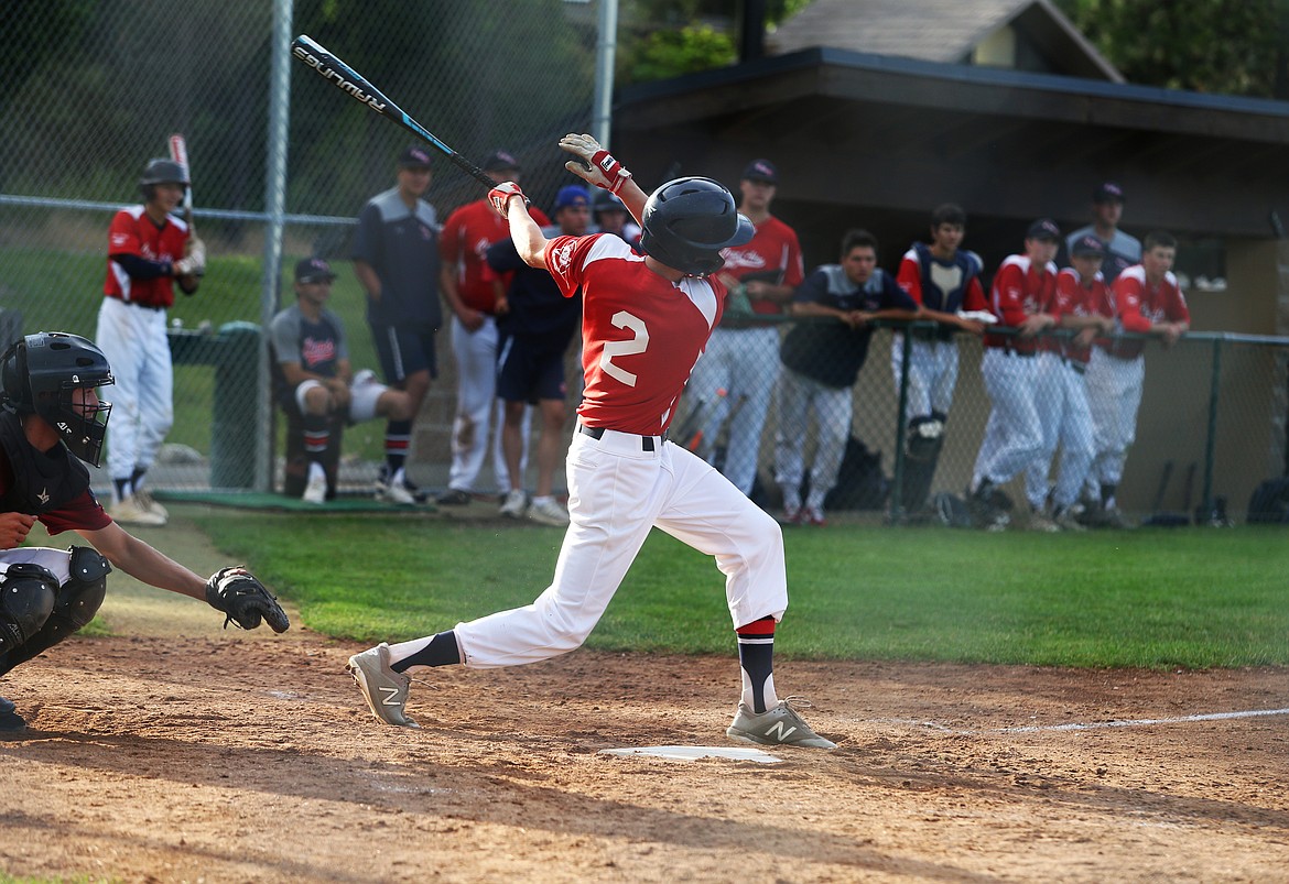 Coeur d’Alene Lumbermen catcher Landen Thompson makes contact for a two-run single to break a 2-2 tie against the Prairie Cardinals during a 2019 game at Thorco Field in Coeur d’Alene.