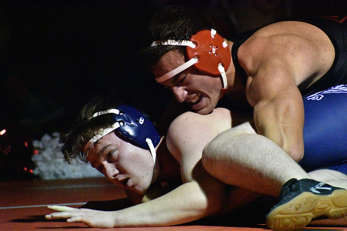 (Photo by DYLAN GREENE)
Senior Isaiah Caralis (top) battles a Bonners Ferry opponent earlier this season. Caralis won one of the team’s Captain Awards.