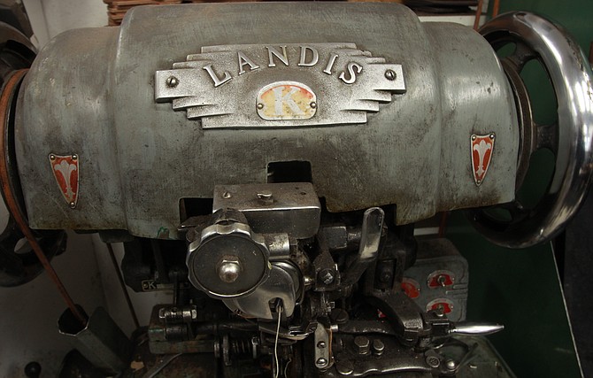 The Landis stitching machine Johnson uses in his shop hearkens back to the 1940s, and survived a fire when the business burned more than a decade ago.