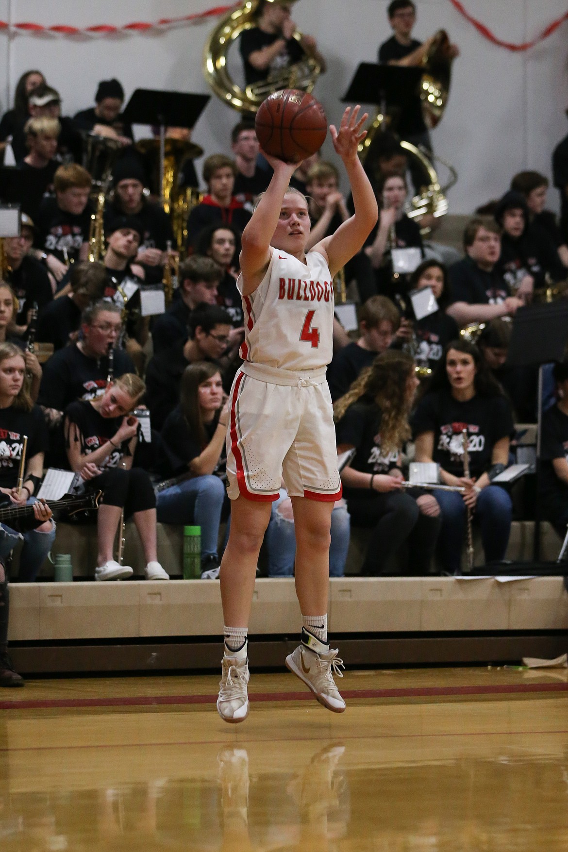 (Photo courtesy of JASON DUCHOW PHOTOGRAPHY) 
 Senior Maddie Morgan pulls up for a 3-pointer during Battle for the Paddle on Jan. 17 at Les Rogers Court.