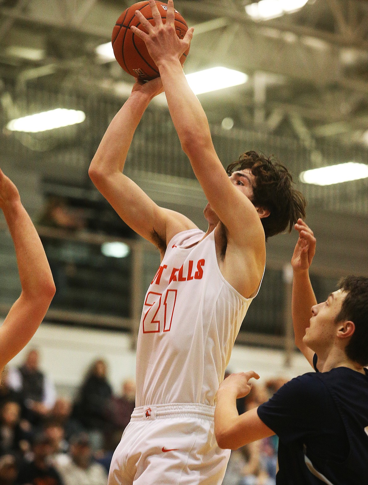 Post Falls’ James Lee goes for a layup against Lake City during Friday night’s game at Post Falls High School.