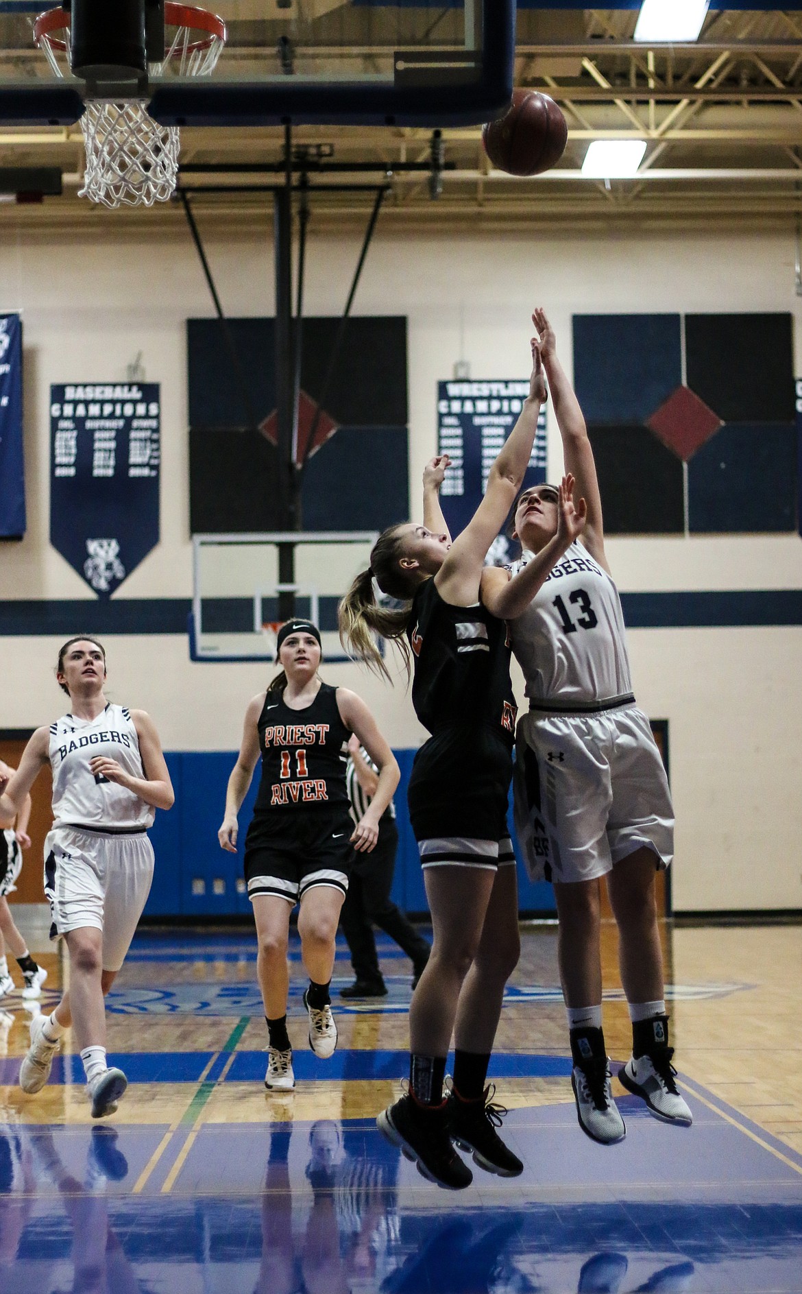 Photo by MANDI BATEMAN 
 Mia Blackmore drives to the basket.