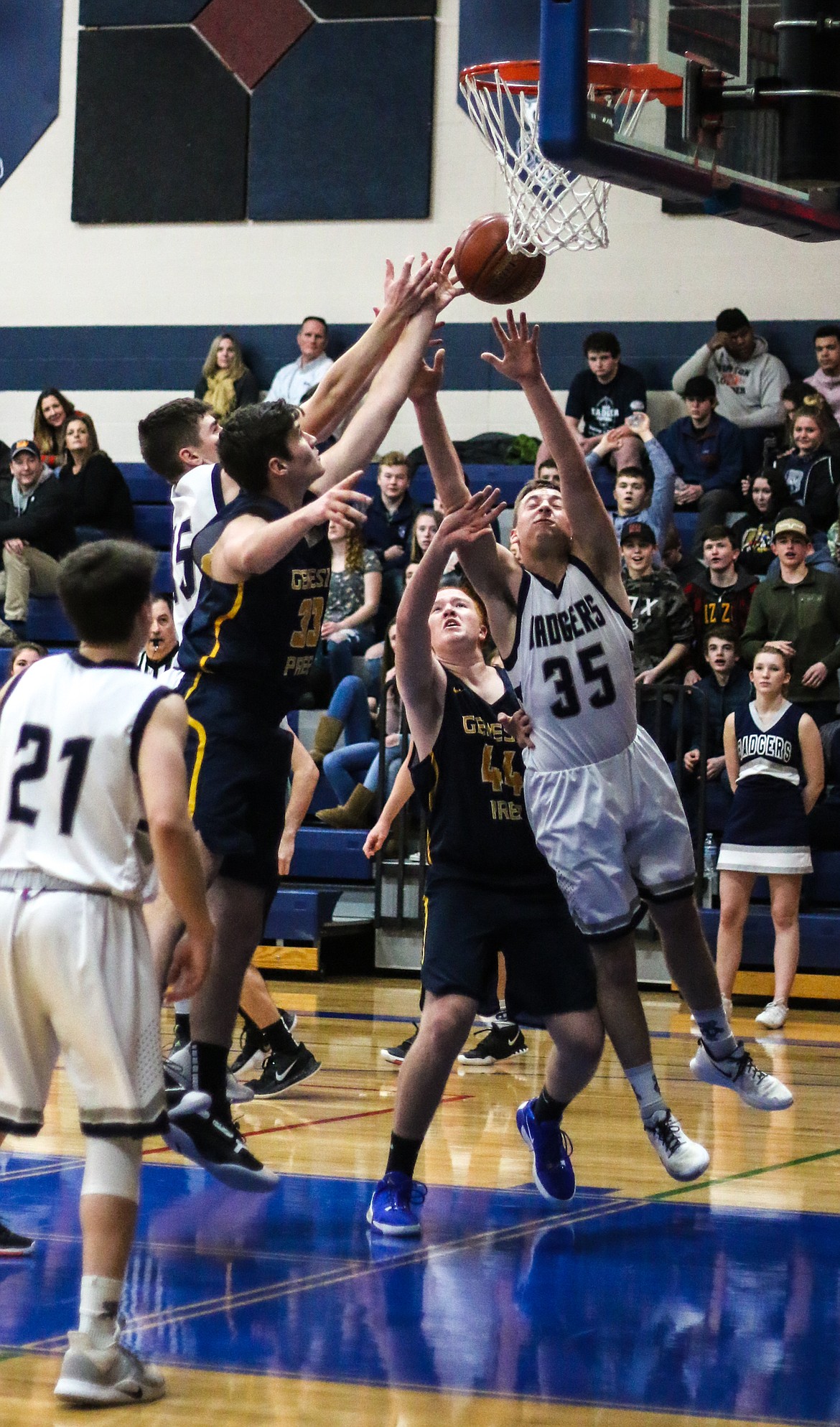 Photo by MANDI BATEMAN 
 The Badger boys battle against their opponents.