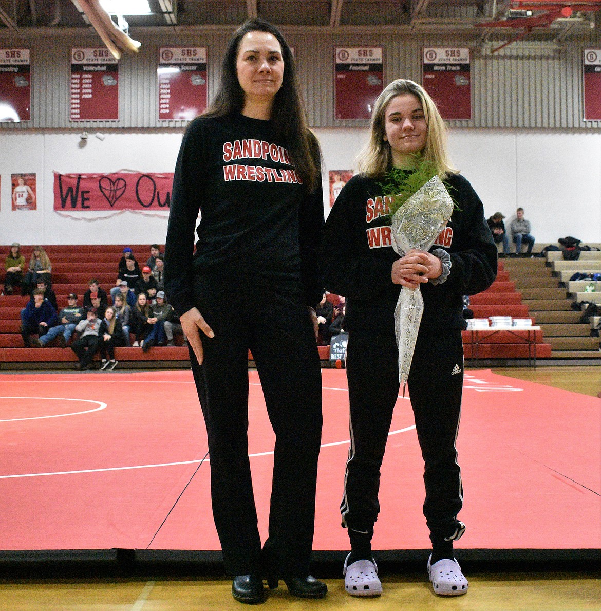 (Photo by DYLAN GREENE) 
 Heather Wallace celebrates senior night with her mom.