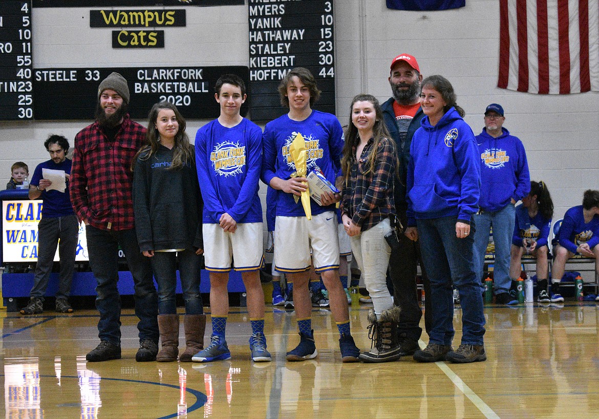 (Photo by DYLAN GREENE) 
 Senior Paul Bopp celebrates senior night with his family.