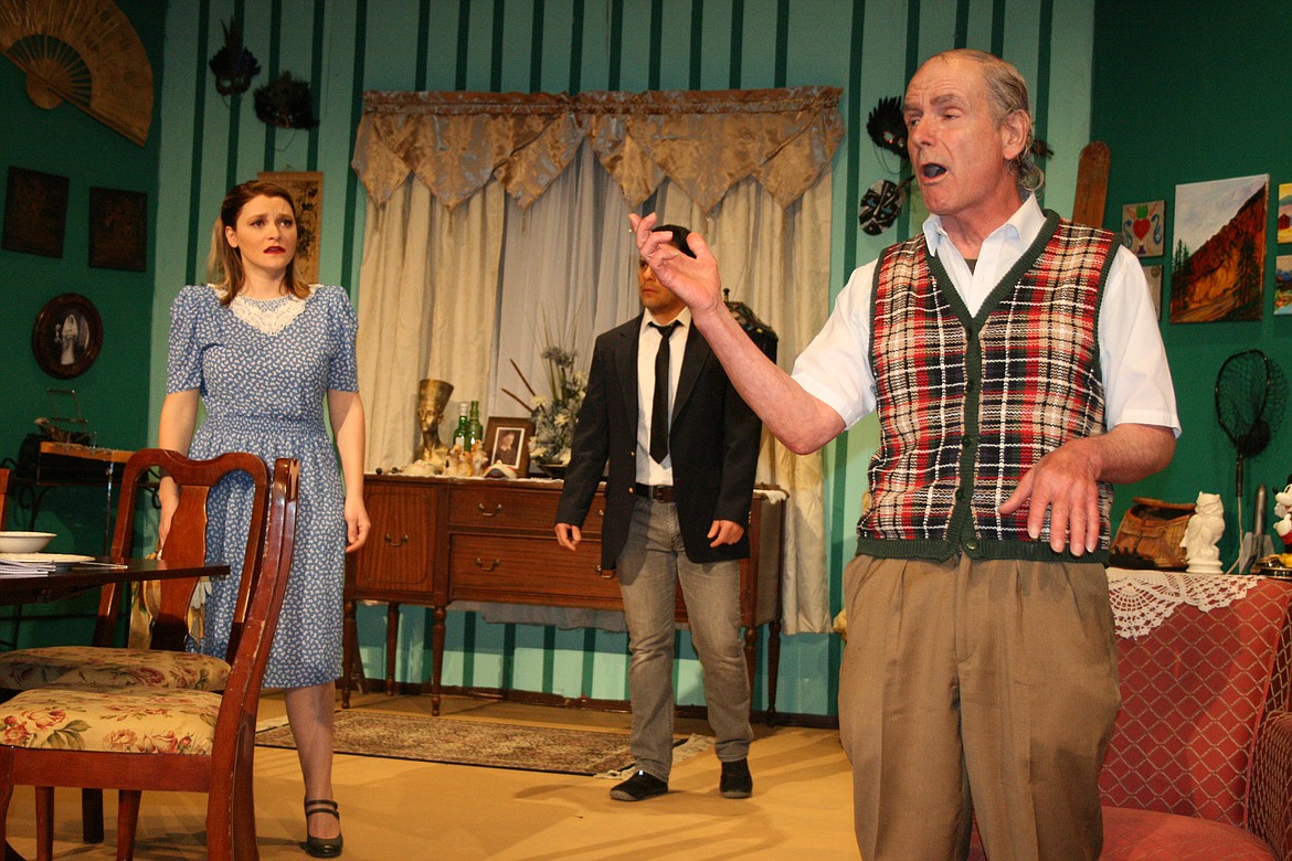 Cheryl Schweizer/Columbia Basin Herald 
  
 Grandpa Vanderhof (Bob Jasman, right) makes a point to Alice (Cecily Hendricks) in the Masquers production of 'You Can't Take It With You.'
