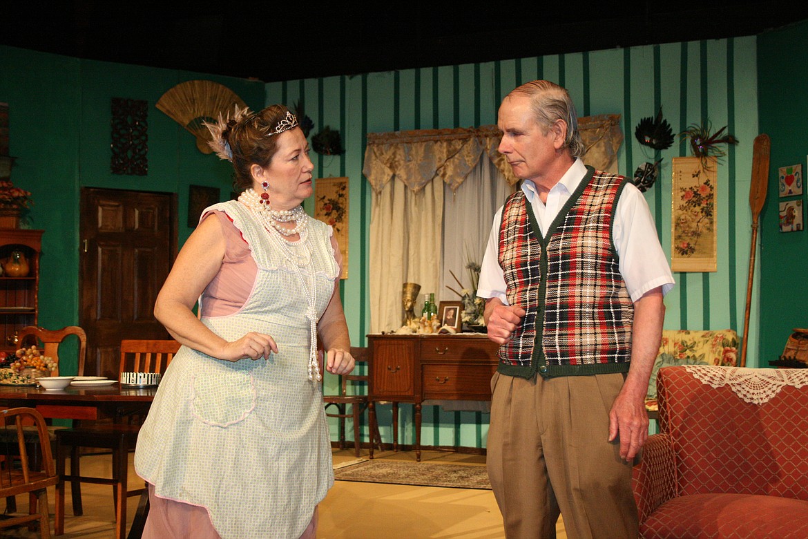 Cheryl Schweizer/Columbia Basin Herald 
  
 The Grand Duchess Olga Katrina (Rosalee Chamberlain, right) wants to know how many people will be coming to dinner - not that Grandpa Vanderhof (Bob Jasman) has any idea. The Masquers production of 'You Can't Take It With You' opens Feb. 14.