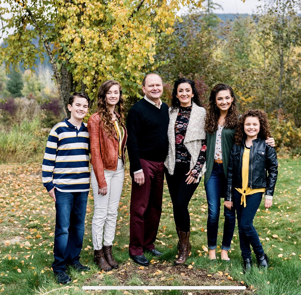 (Courtesy photo)
Bonner County’s Katherine Funk-Adlard, third from right, gets a photo taken with her family. She is representing the state of Mrs. Idaho in this coming weekend’s national United States of America Pageant.