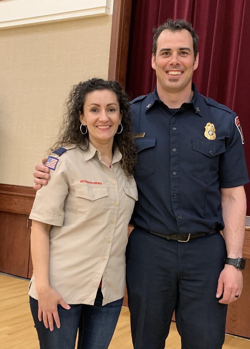 (Courtesy photo)
Bonner County’s Katherine Funk-Adlard, left, gets her picture taken with Selkirk Fire, Rescue & EMS’ Michael Gow. Funk-Adlard is representing the state of Mrs. Idaho in this coming weekend’s national United States of America Pageant.