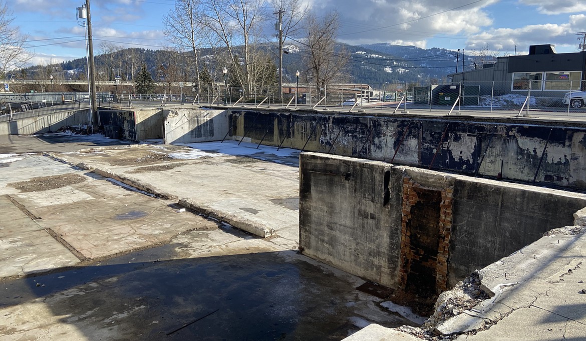 A year after a fire gutted two historic buildings in downtown Sandpoint, an empty space sits where five thriving businesses once stood. However, plans are in the early stages to rebuild at the site.