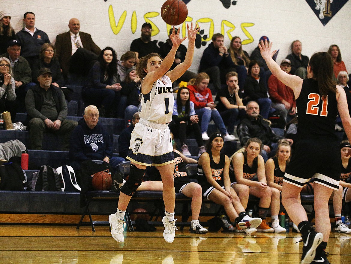 Timberlake’s Taryn Soumas shoots a 3-pointer during Monday’s 3A District 1 tournament game against Priest River.