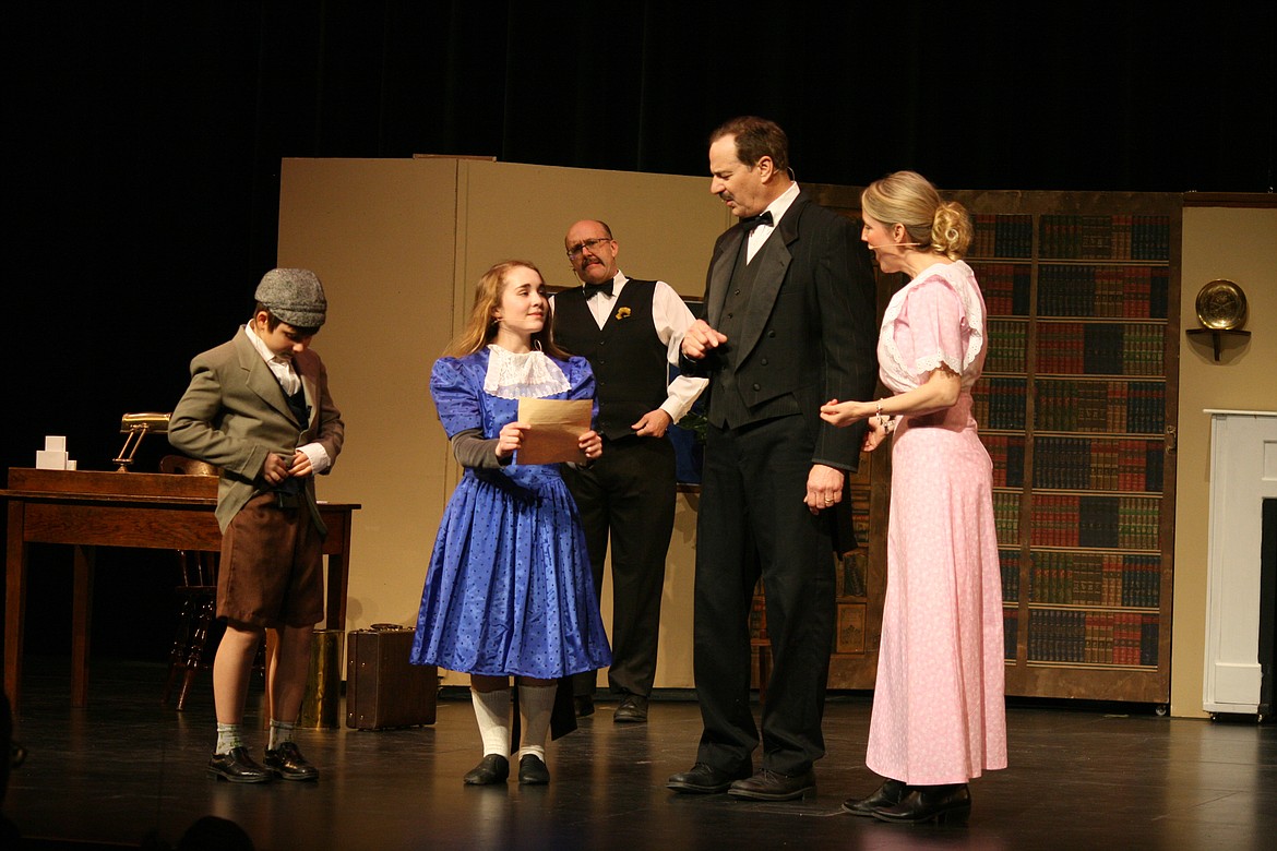 Cheryl Schweizer/Columbia Basin Herald | Jane Banks (Emma Foley, second from left) and her brother Michael (Lev Rosberg, left) have their own qualifiations for a new nanny in the Quincy Valley Allied Arts production of “Mary Poppins.” Their father George (Paul Slager, second from right) and mother Winifred (right) aren’t convinced.