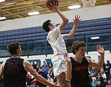 Post Falls heats up late
