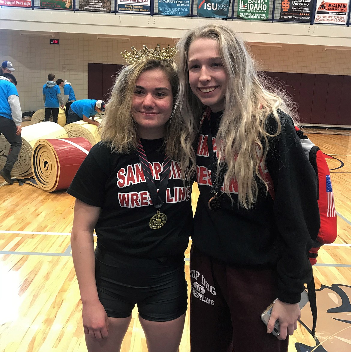 Senior Heather Wallace (left) took first at 120 pounds and sophomore Kayelin Johansen tied for third at 106 at the Idaho Girls Wrestling Finals on Saturday in Pocatello.