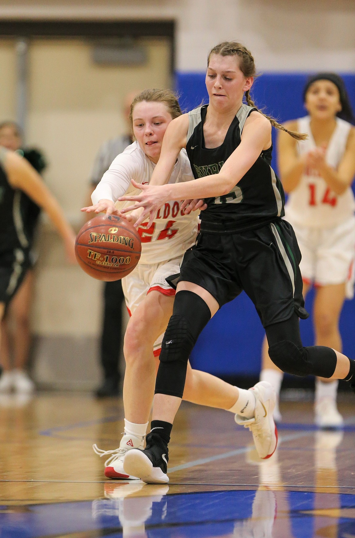 (Photo courtesy of JASON DUCHOW PHOTOGRAPHY)
Junior Kaylee Banks goes for a steal late in the fourth quarter of Thursday’s 4A state game against Burley.