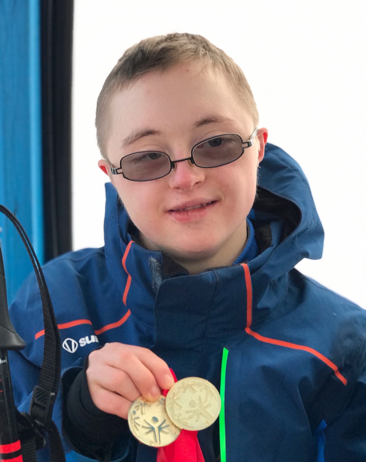 (Photo courtesy of CHRIS PAINTER)
Campbell Wyman holds up the two gold medals he earned at Idaho’s Special Olympics Winter Games on Feb. 8.