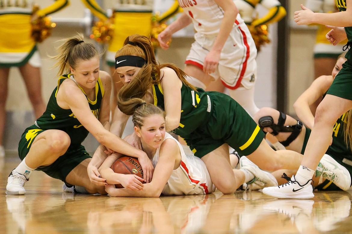 (Photo courtesy of JASON DUCHOW PHOTOGRAPHY) 
 Freshman Daylee Driggs battles for a loose ball with a pair of Bonneville players Friday night.