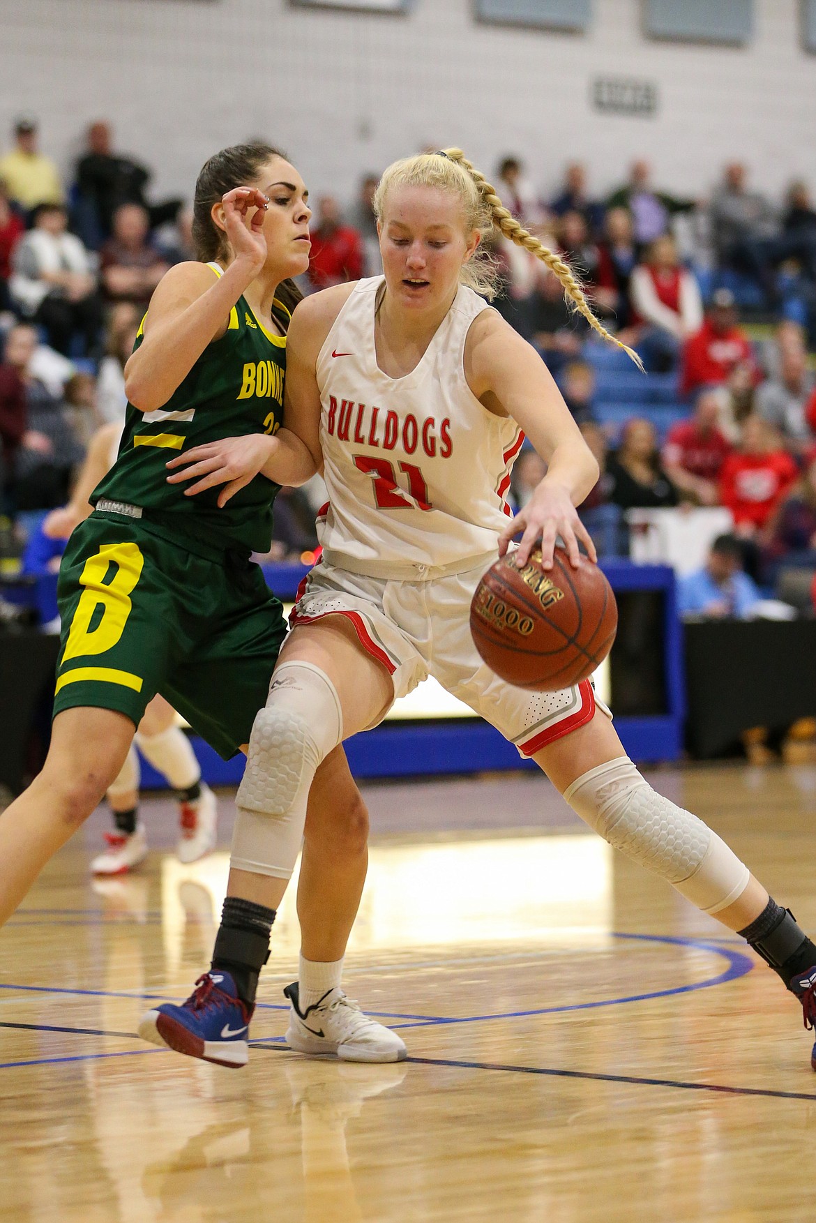 Junior Hattie Larson drives toward the basket during the first half of Friday night’s 4A state semifinal game against Bonneville.