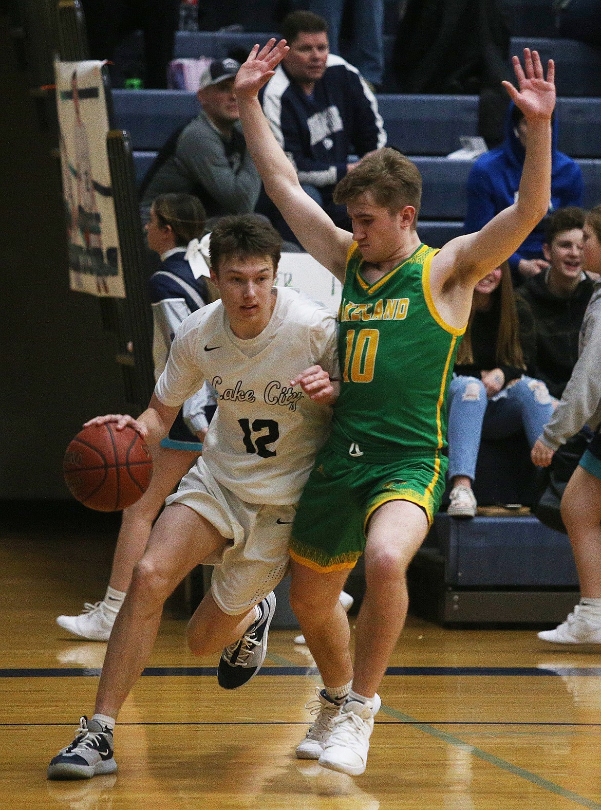 Lake City’s Seth Hanson dribbles the ball around Lakeland High’s Carson Seay.