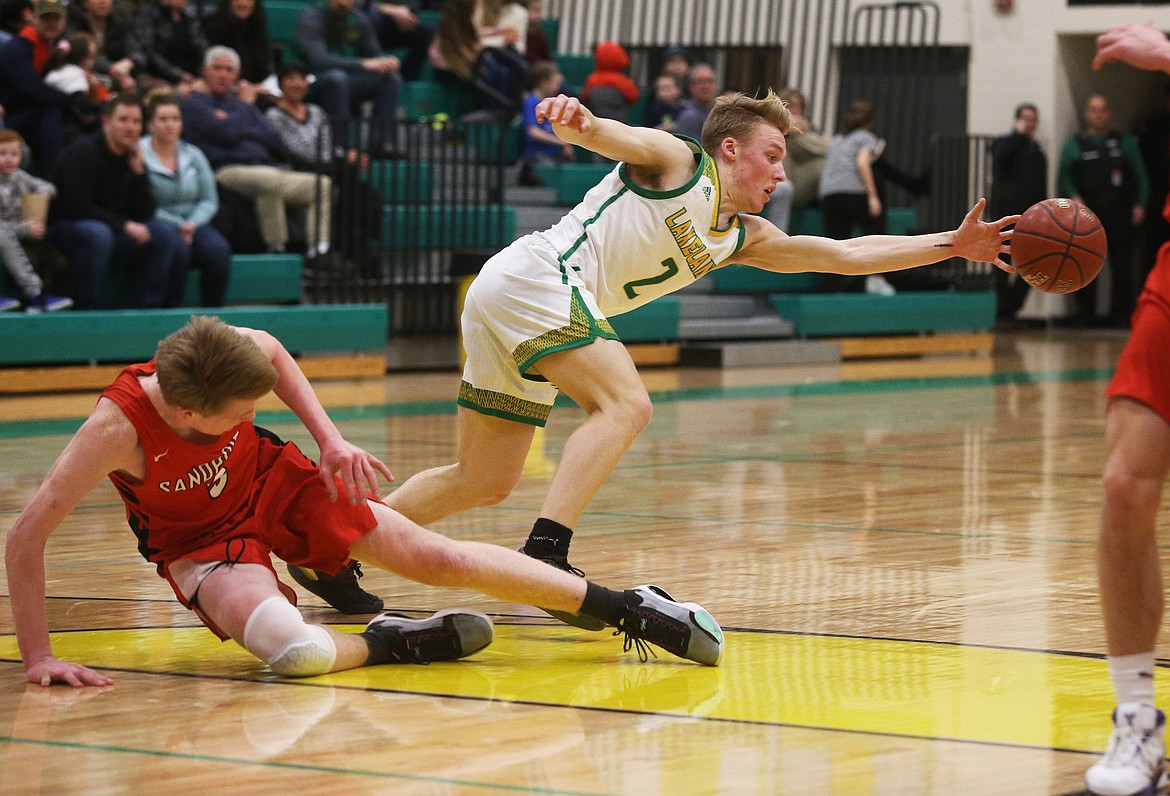 Lakeland High’s Ben Zubaly goes after a loose ball during Monday’s game against Sandpoint.