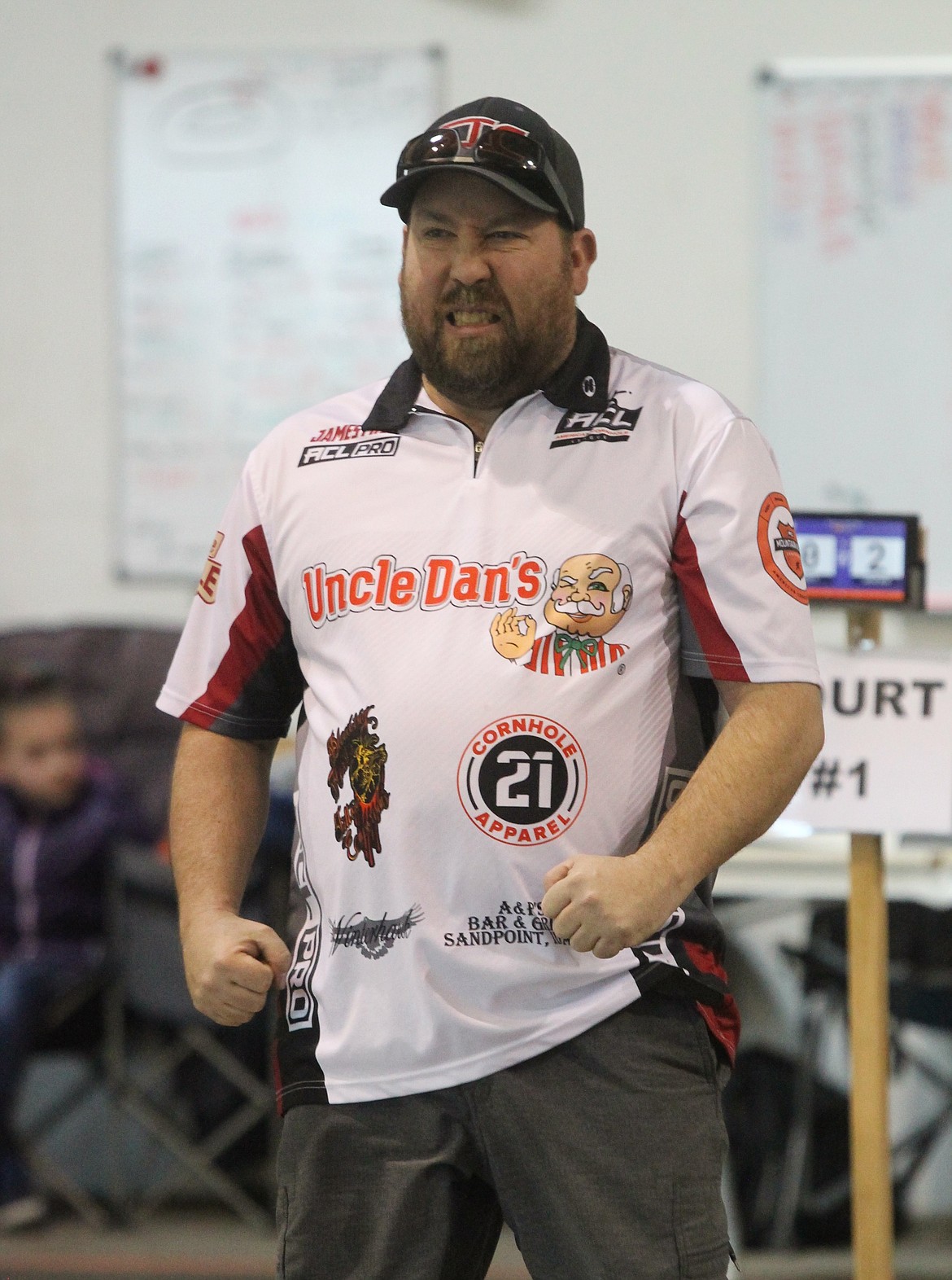 James Mize reacts after a toss in Saturday’s cornhole tournament in Post Falls.