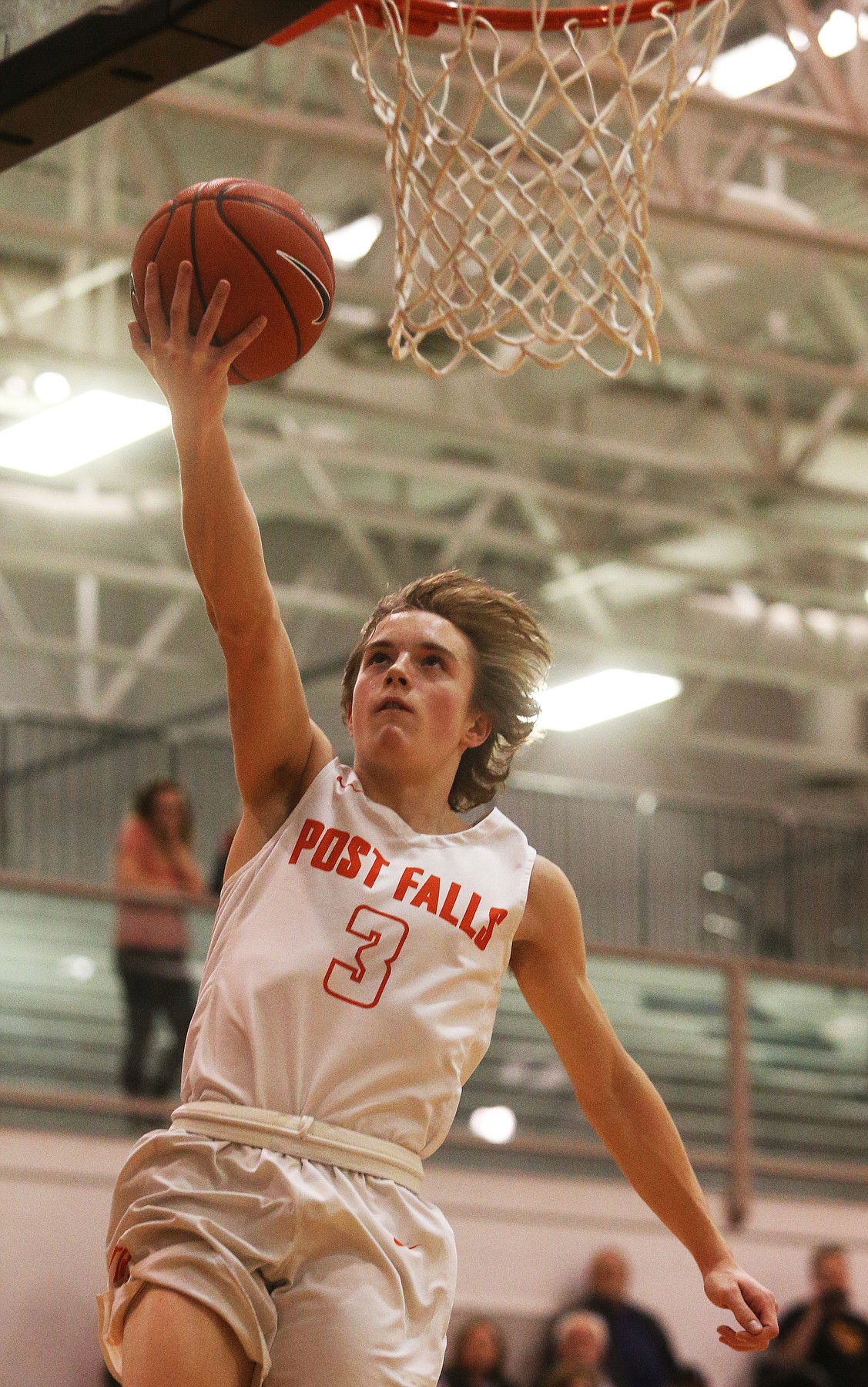 Post Falls’ Caden McLean scores on a breakaway layup against Lewiston last Wednesday.