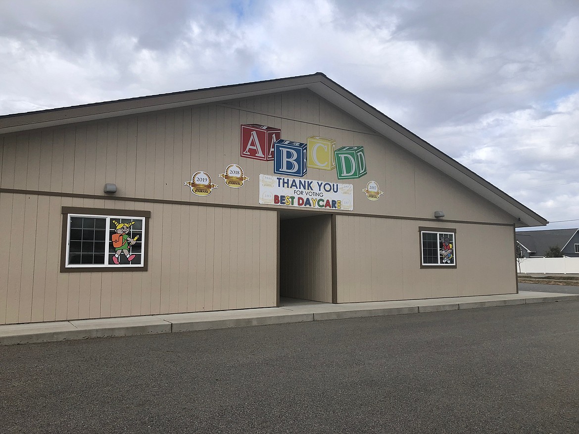 ABCD Daycare in Hayden proudly displays their “Best Daycare” banner,
which the business has won every year since 2008 in the Best of North Idaho competition.