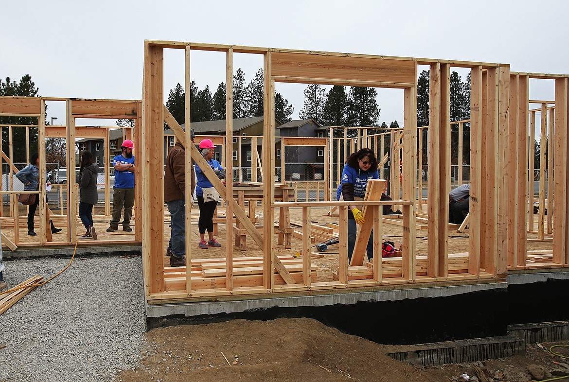 Habitat for Humanity, Lowe's employees and KTEC volunteers gathered to build six-units for local families as part of Habitat for Humanity’s International Women Build week. (LOREN BENOIT/Press)