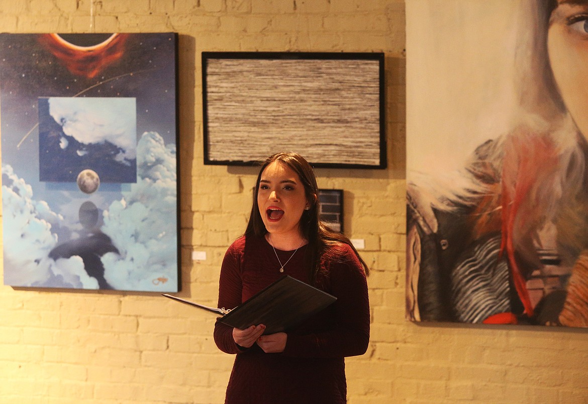 Halle Schmitt, actor for Coeur d’Alene Summer Theatre, performs “Speechless” from the Aladdin live action movie during an International Women’s Day event Friday at the Human Rights Education Institute.