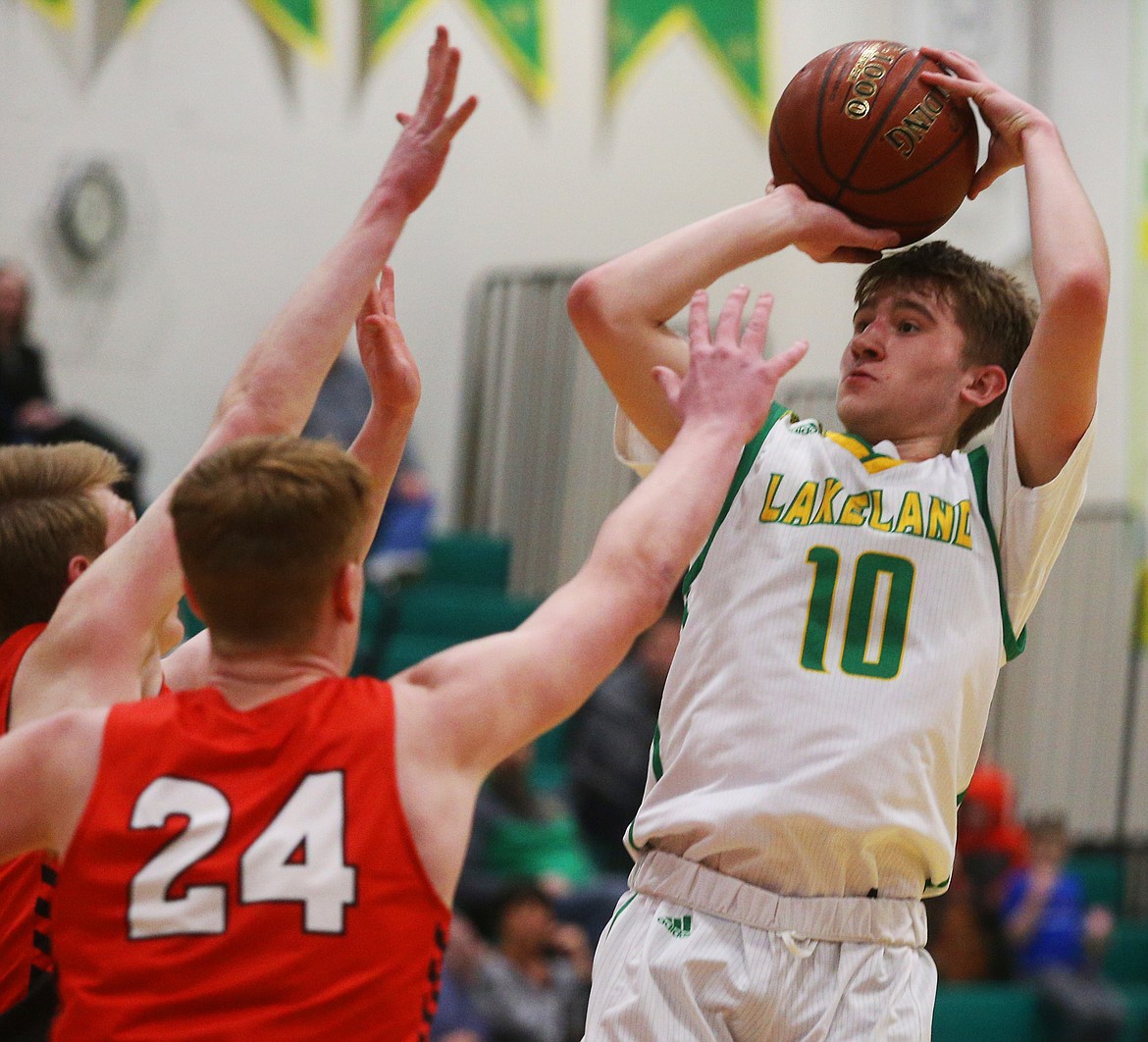 Lakeland High’s Carson Seay shoots a 3-pointer against Sandpoint in a game at Lakeland on Feb 24.