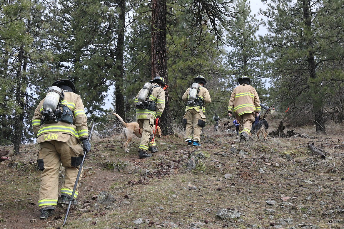 BILL BULEY/Press 
 North Idaho firefighters makes their way up Canfield Mountain Sunday morning.