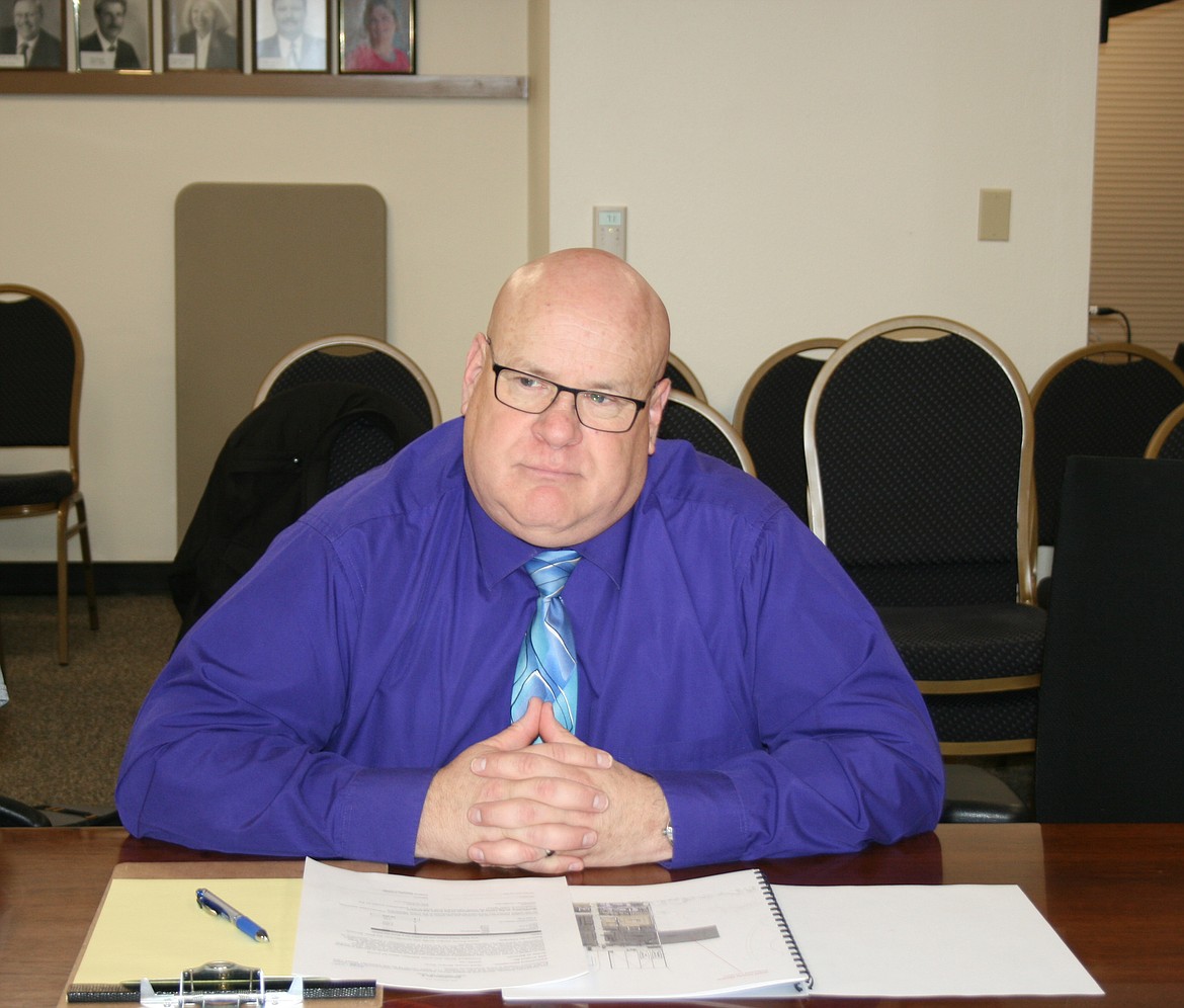 Cheryl Schweizer/Columbia Basin Herald 
  
 Grant County Coroner Craig Morrision discusses the options for a new morgue with Grant County Commissioners Monday.