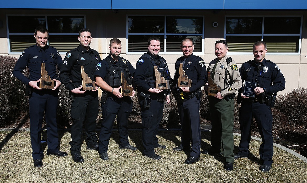 The Kootenai County Substance Abuse Council also presented awards recognizing the officers in Kootenai County who made the most DUI arrests in 2019. From left: Chris Schatz, Coeur d’Alene Police; Corporal Ben Kirkendall, Spirit Lake Police; Officer Cody Childers, Post Falls Police; Officer Eric Bailey, Rathdrum Police; Corporal Jon Cushman, Idaho State Police; Deputy Tom Broughton, Kootenai County Sheriff's Office. Coeur d’Alene Tribal Police Officer Jake Donnerberg also received an award. The council also honored Coeur d’Alene Police Office Nick Knoll, far right, who made 108 DUI arrests in 2019. (LOREN BENOIT/Press)