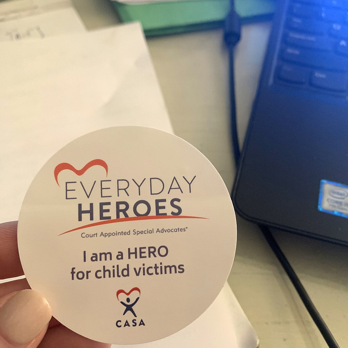 (Photo courtesy NORTH IDAHO CASA) 
 A badge sharing the motto of the Court Appointed Special Advocate program:  "Everyday Heroes."