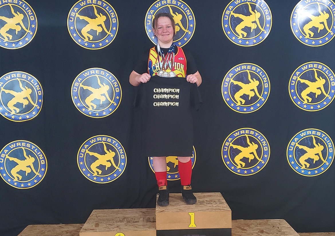 Sandpoint Legacy Wrestling Club’s Grace Balch stands atop the podium at the Washington State Wrestling Association Women’s Columbia Cup on Saturday in Richland. Balch, competing in the girls U14 schoolgirl division, captured three golds in folkstyle, freestyle and Greco-Roman wrestling at the event.