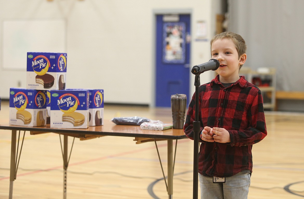 First-grader Toby Lawson recites numbers of the mathematical constant pi during the school's Pi Day competition at Seltice Elementary School. (LOREN BENOIT/Press)