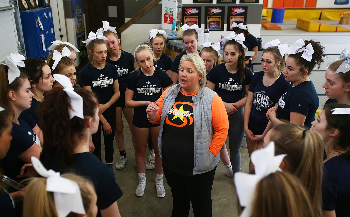 Spotlight Studio North Star coach Stacey Rae Steinwandel addresses the Lake City High School Cheer team members during practice at the studio earlier this week. Lake City cheerleaders have qualified to compete at state.