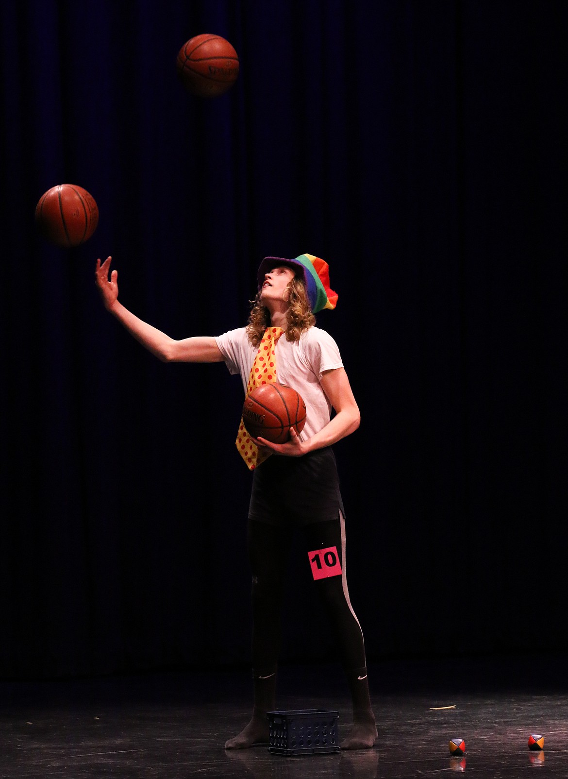 Photo by MANDI BATEMAN 
 Jake Jelinek perfomeed a juggling act for his talent during the Mr. BFHS competition last Friday.