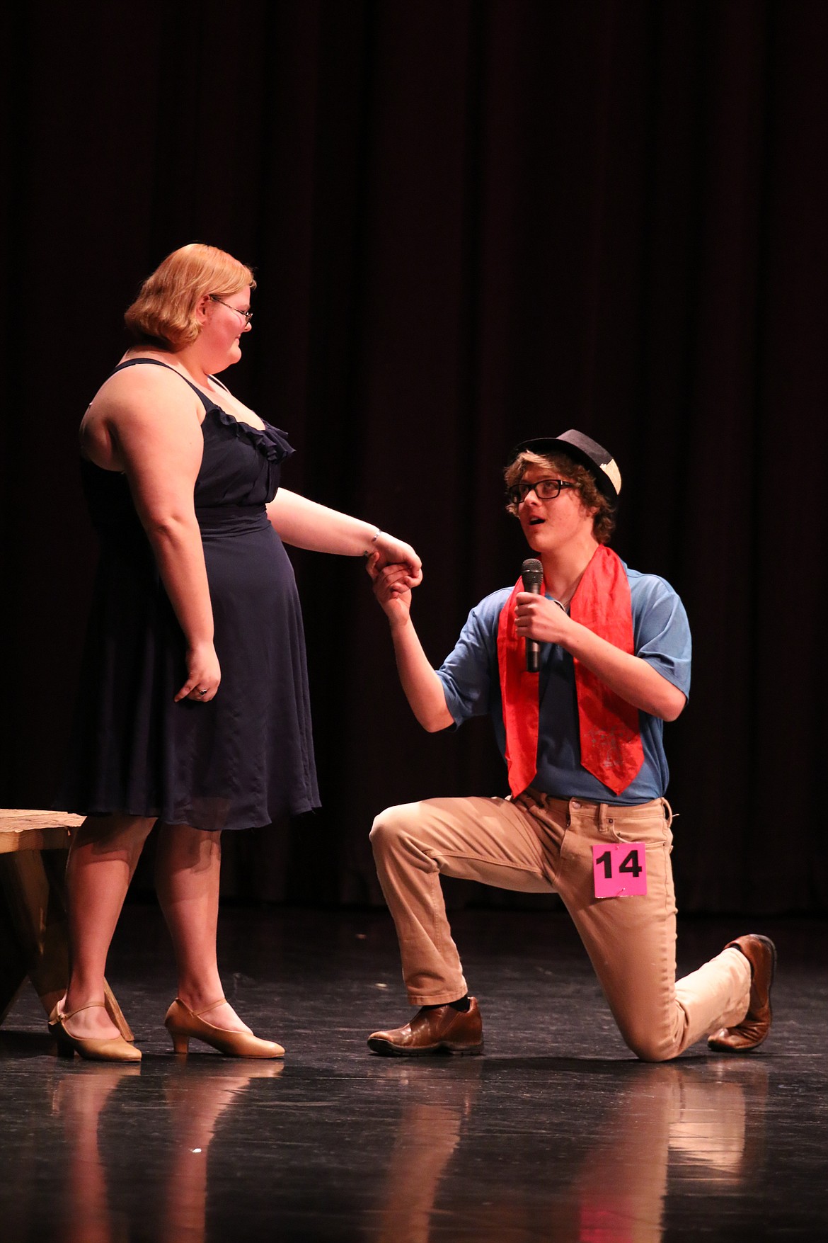 Photo by MANDI BATEMAN 
 2020 Mr. BFHS Battle of the Decades: Cameron Rae delivers his pick up line.