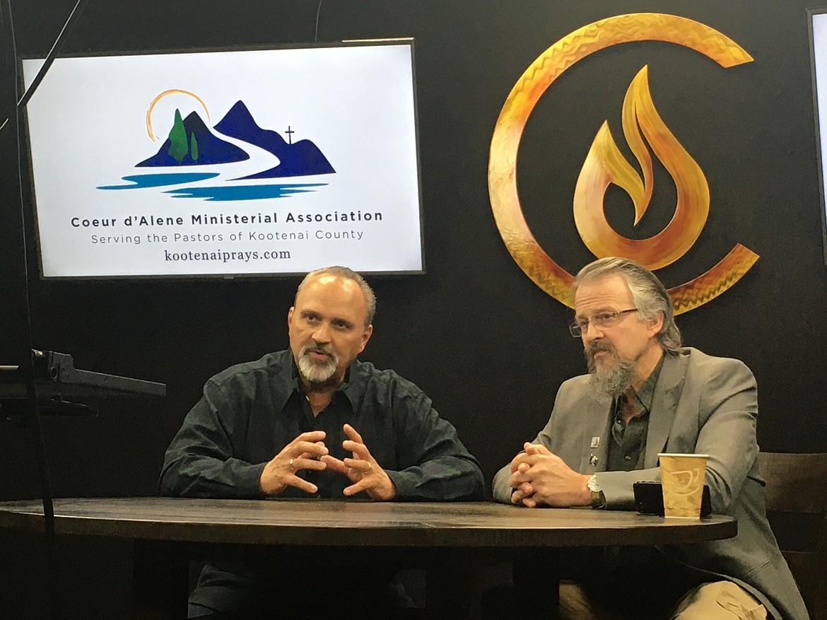 Pastor Paul Van Noy, left, and Rep. Tim Remington, also a pastor, record the opening statements that will air in a video to be released for Sunday’s Day of Prayer in Kootenai County.