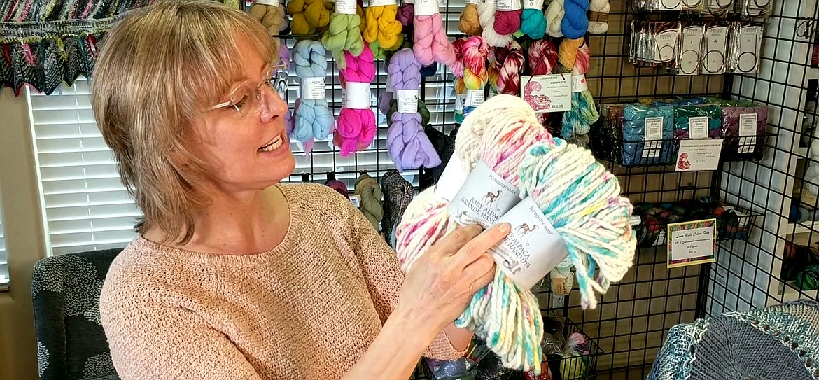 Alpaca Direct co-owner Kelley Hobart discusses different yarns during a video for the store’s YouTube channel. Alpaca Direct has tons of online videos for those who want to learn, and is offering curbside pickup for local customers during pandemic closures.