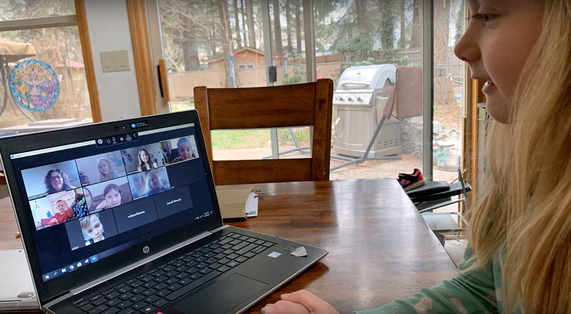 Students and teachers show what learning life is like at home in Coeur d’Alene School District’s new “Remote Learning” video on YouTube. (Screengrab via YouTube)