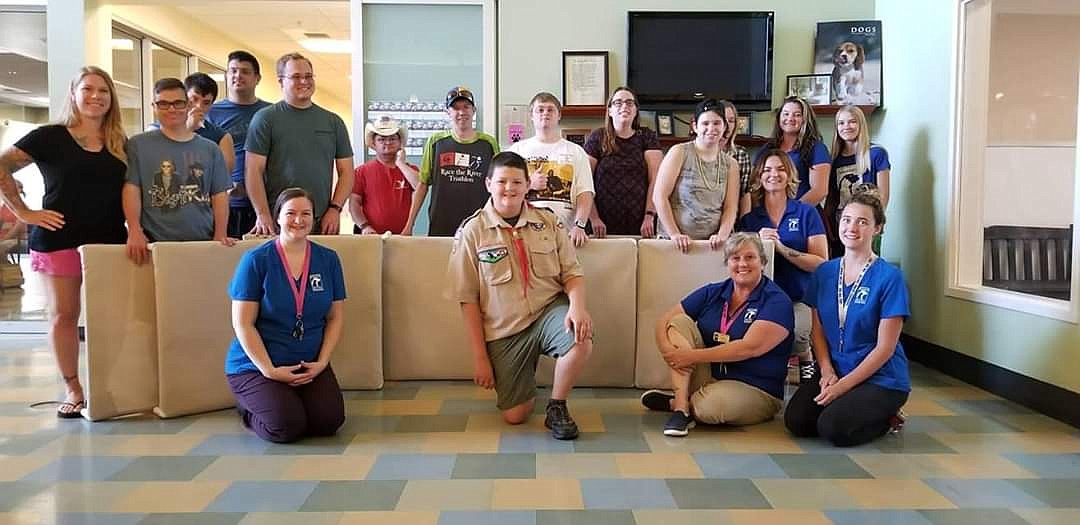 Eagle Scout James Laker poses with staff and crew at Specialized Needs Recreation in Coeur d’Alene.