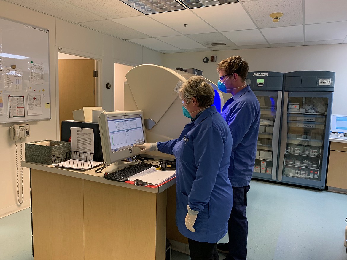 (Photo courtesy BONNER GENERAL HEALTH)
Bonner General Health employees are pictured at work in the hospital’s lab. The Sandpoint hospital recently had its testing system validated, opening the door for it to conduct novel coronavirus tests in-house.