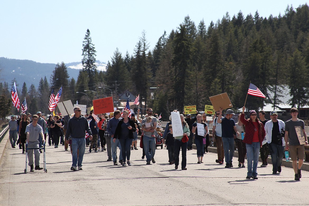 (Photo by KEITH KINNAIRD) 
 A few of the several hundred people protest Idaho's stay-at-home order.