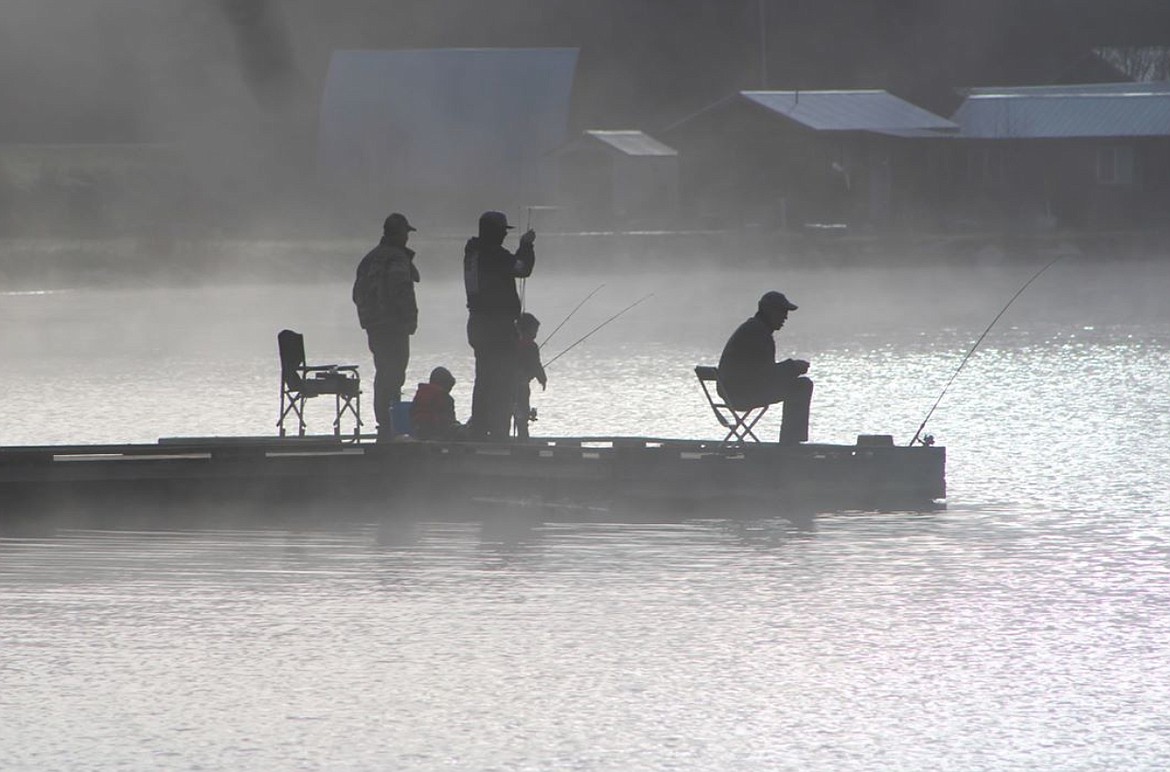 Anglers try their luck Friday morning at Kelso Lake, due north of Athol. Idaho's lakes, boat launches, trailheads and parks have seen an abundance of Washington travellers since their governor, Jay Inslee, closed almost all public outdoor recreation. Inslee announced Monday he would ease those restrictions starting May 5. (Photo courtesy of Taryn Thompson)