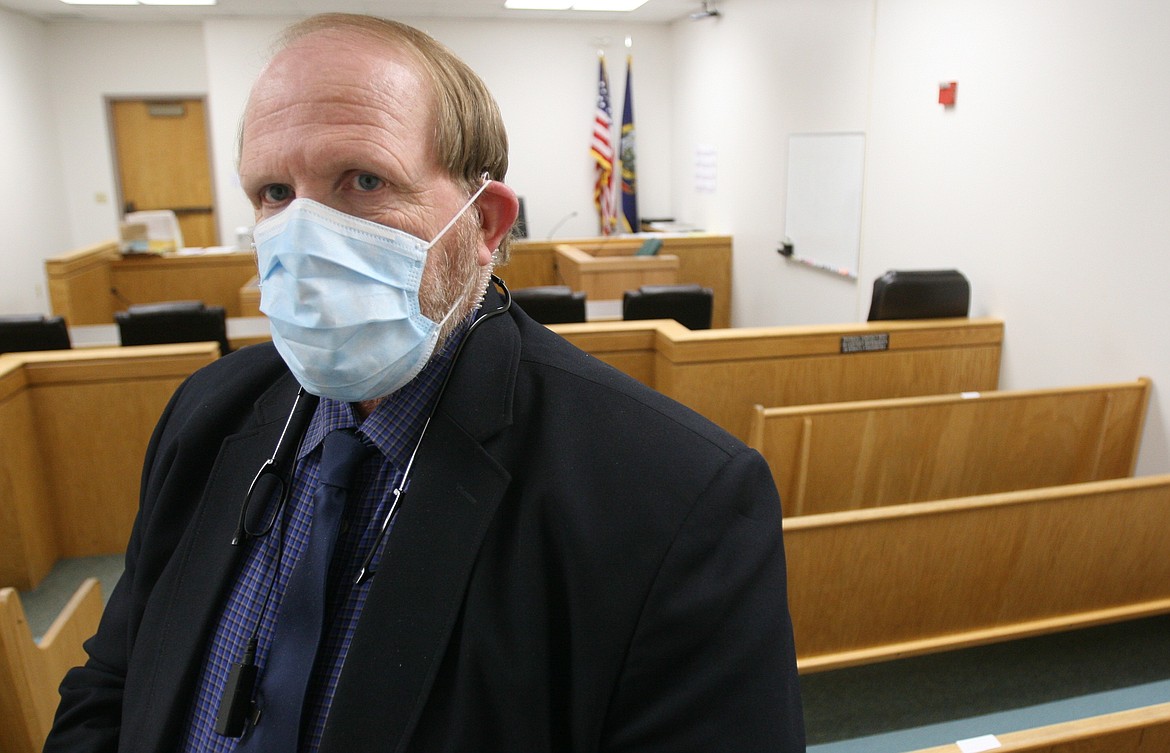 Ralph Bartholdt
Kootenai County bailiff Rick Simonsen tried out one of the masks he and his courthouse team will be required to wear beginning today. The Supreme Court has ordered that anyone inside a courthouse must wear a mask, scarf or bandana to cover their mouth and nose.