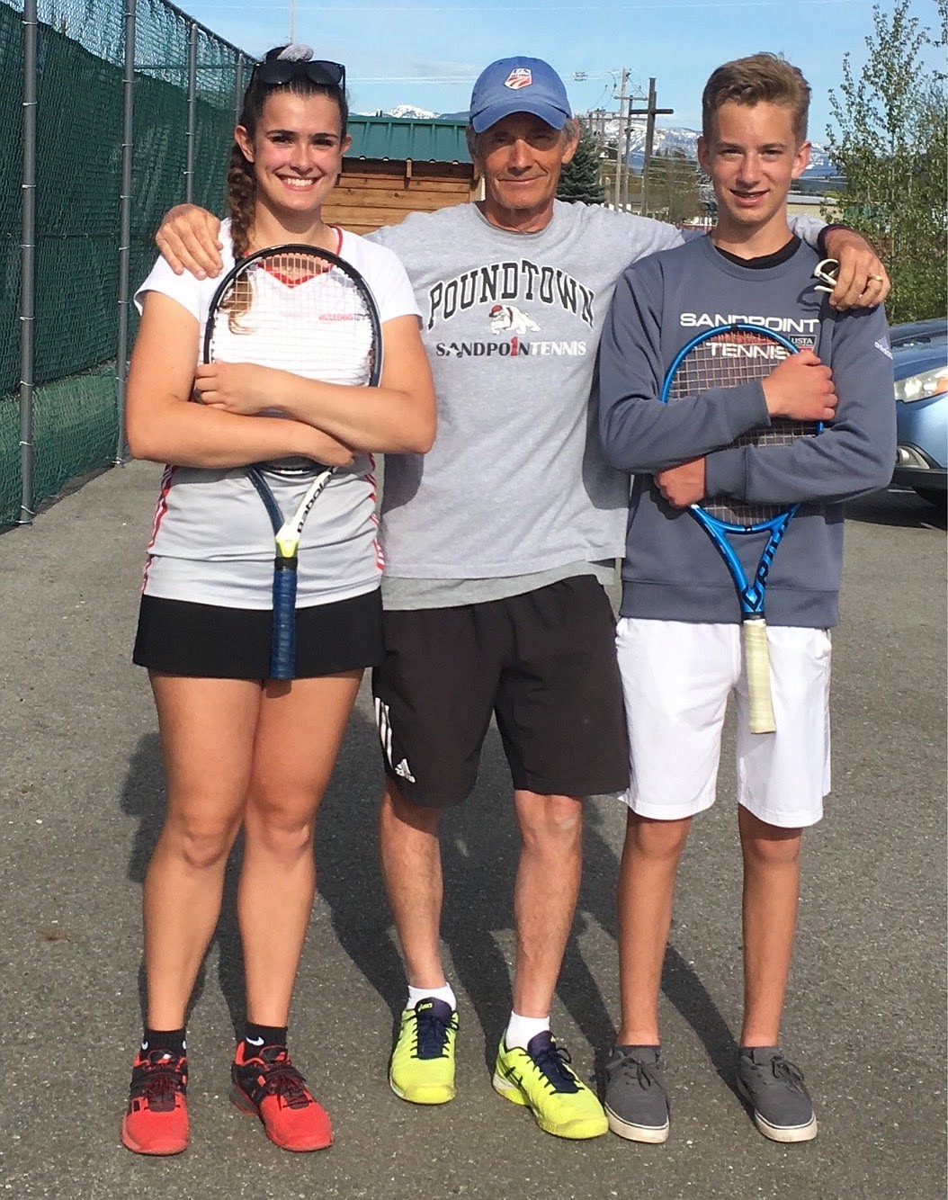 (Courtesy photo) 
 Jenny Slaveck (left) poses for a photo with head coach Kent Anderson and teammate Christian Story.